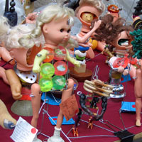 Selling deformed dolls at the market