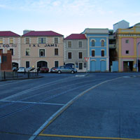 Coloured warehouses at the water front
