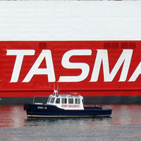 tug boat beside the Spirit of Tasmania
