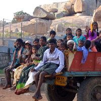 Locals off to school in the back of a truck