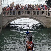 Crowded bridge over the canal