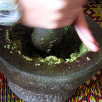 Grinding the curry paste