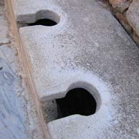 The first toilets with running water from the Roman times