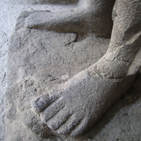 Carved feet at Elephanta Island in Bombay
