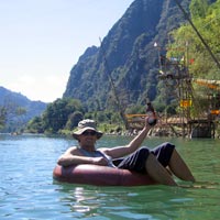 tubing down the river in Vang Vieng
